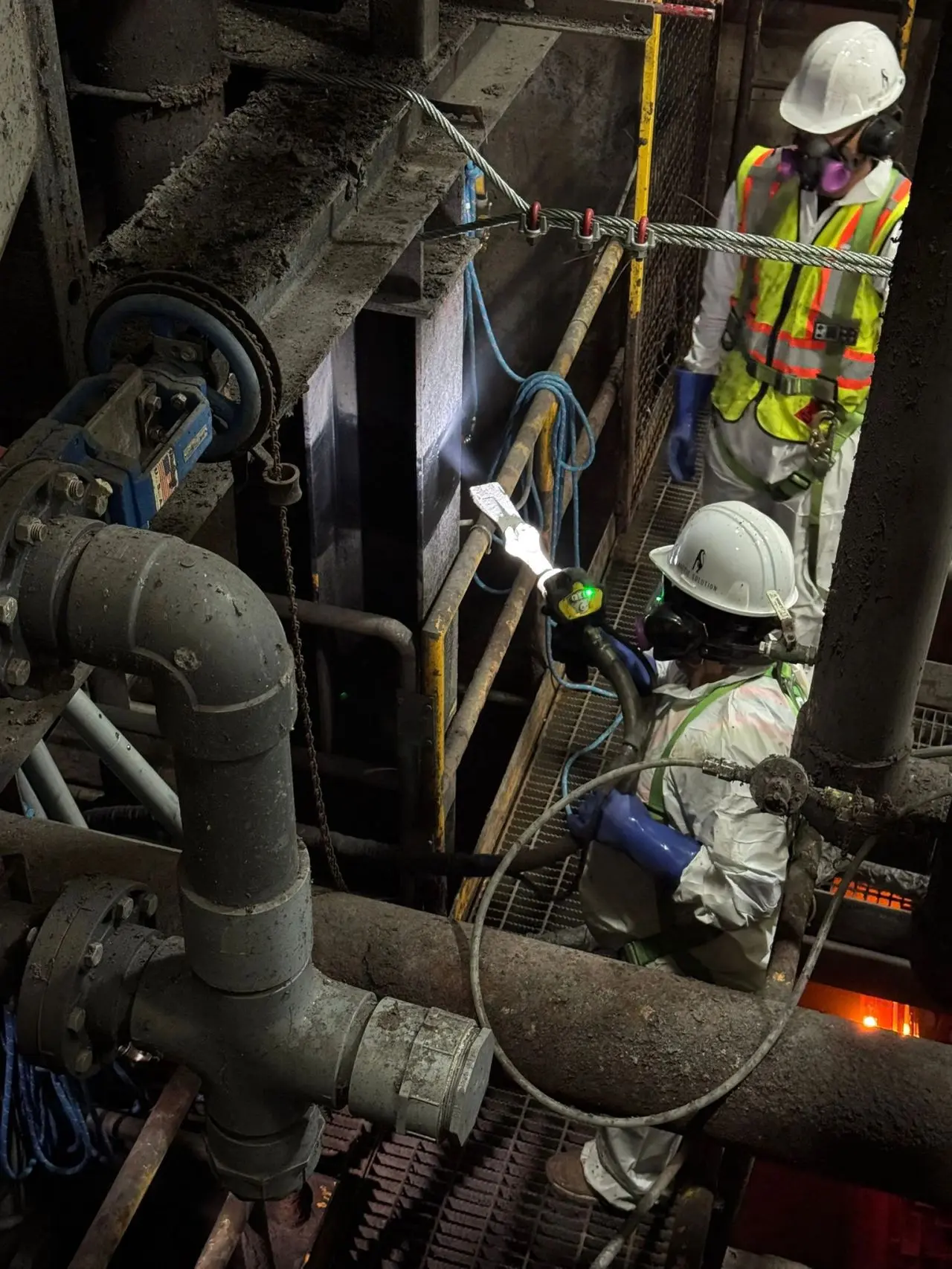 Overhead image of workers on a job site.